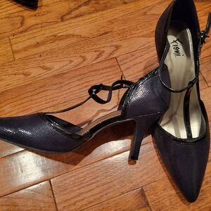 Black 3 inch strap heels. Light Patent